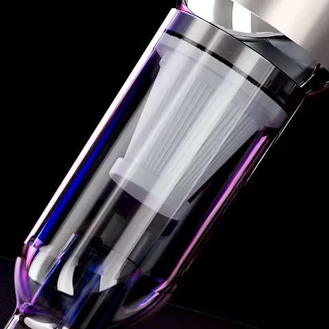 Close view of the clear dust canister on the Veylans V1 with the washable HEPA element inside