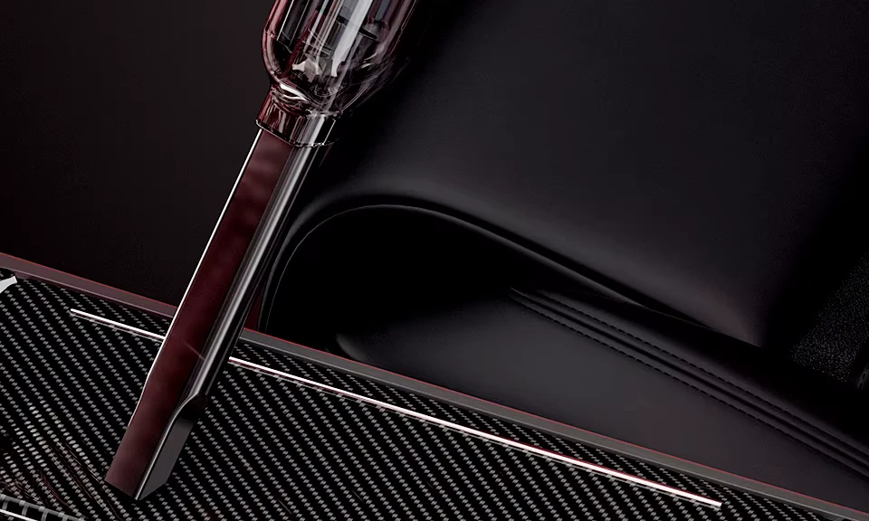 The slim crevice nozzle of the Veylans V1 reaching into a tight interior seam